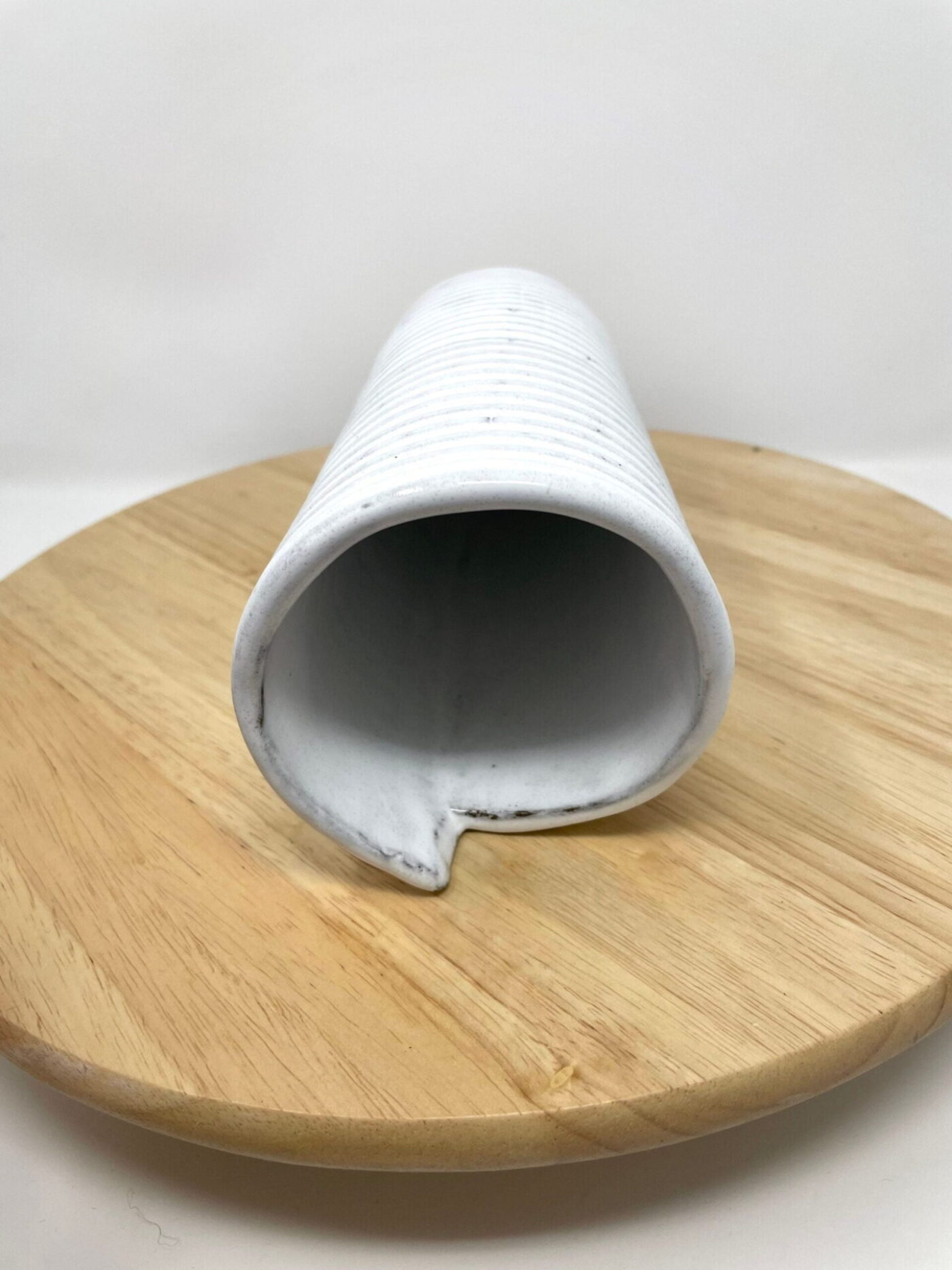 Hand-Built White Striped Ceramic Vase — in use