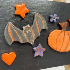 Halloween ceramic magnets 7 in a set/ pumpkin, bat, stars, and a purple flower fridge magnets/ magnetic black board