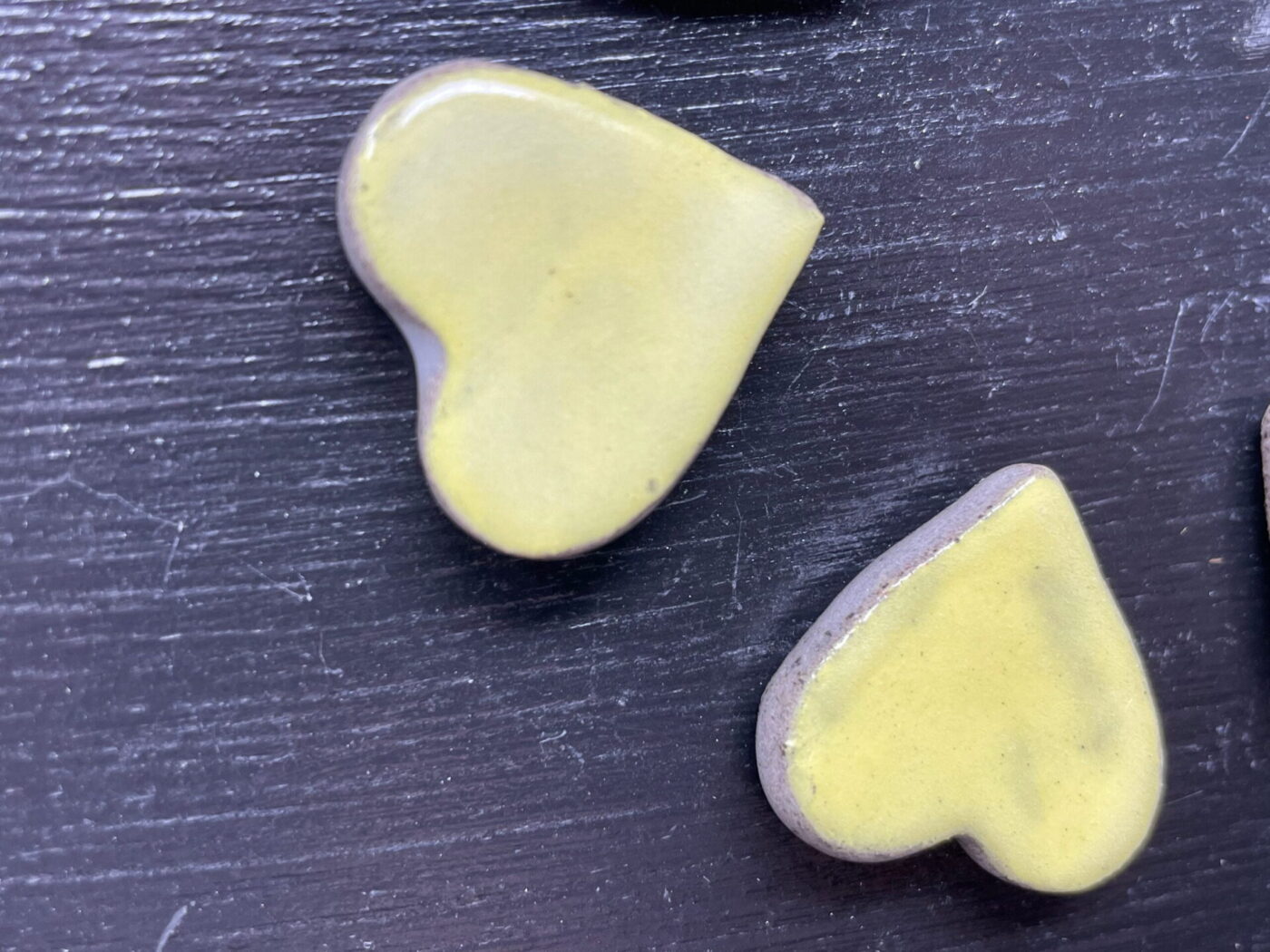 Pastel Yellow Ceramic Heart Magnets — Set of 6 — top view