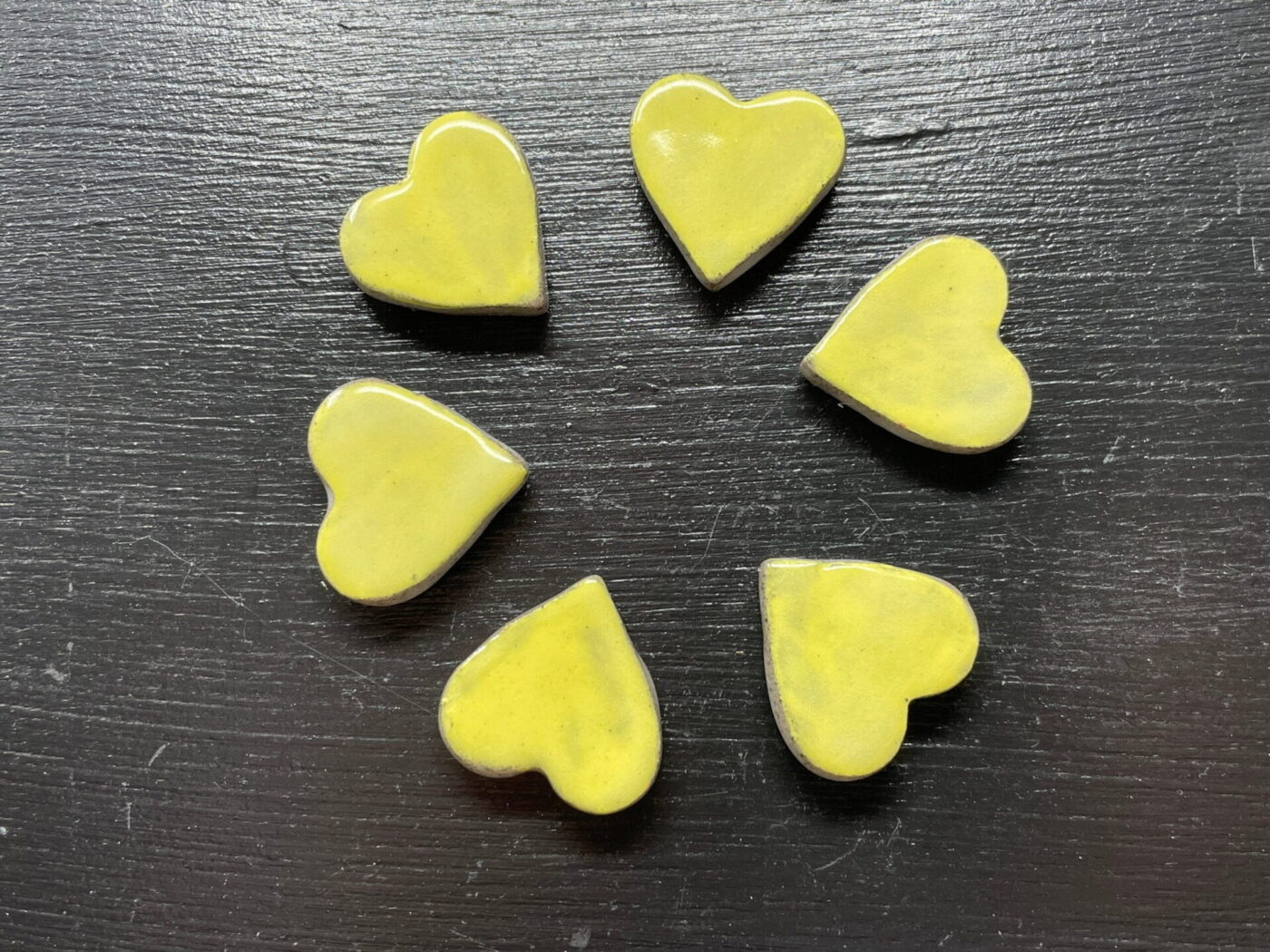 Pastel Yellow Ceramic Heart Magnets — Set of 6 — side view