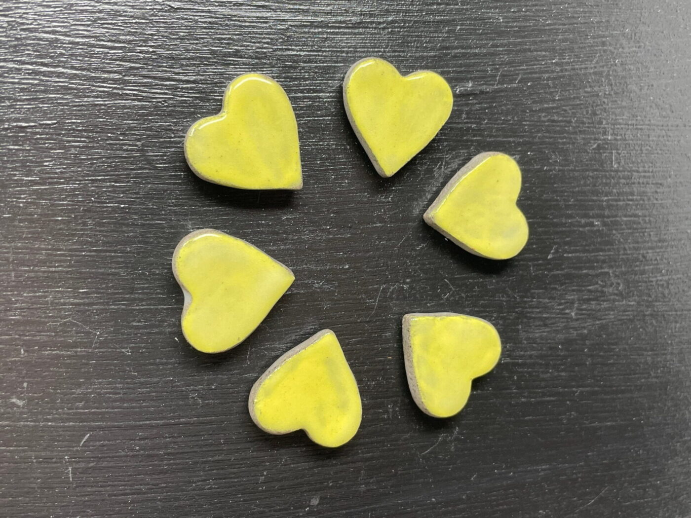 Pastel Yellow Ceramic Heart Magnets — Set of 6 — in use