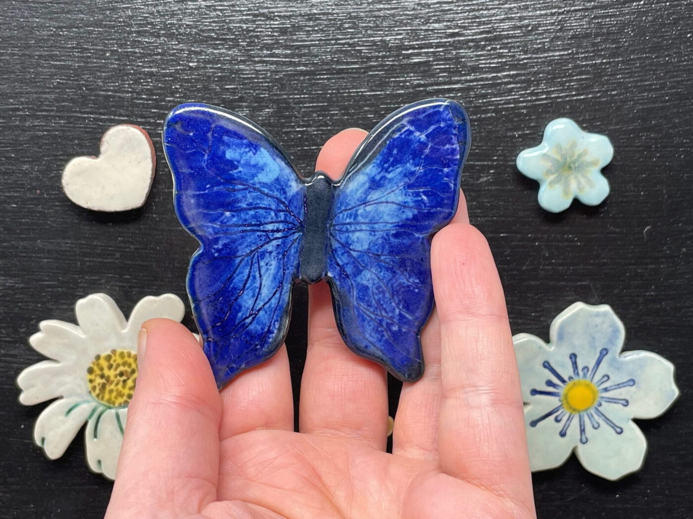 Cobalt Butterfly Magnet Set — Blue, Orange & White Flowers — detail view