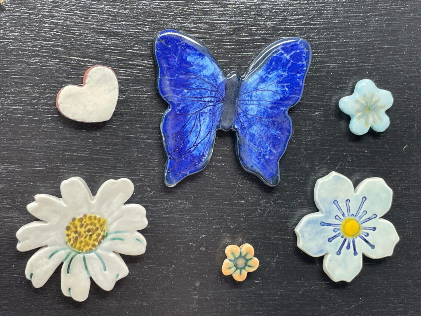 Cobalt Butterfly Magnet Set — Blue, Orange & White Flowers — close-up