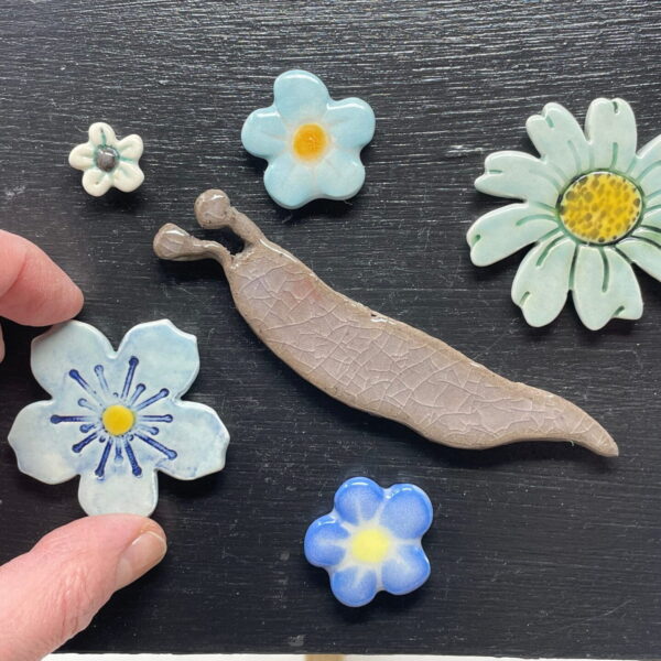 Handmade ceramic slug with blue and white flowers ceramic fridge magnet set / Artisan Etsy Decor