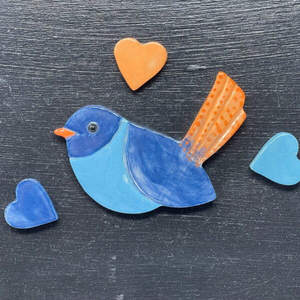 Set of 4 Nature inspired magnets including a cute bird and three love heart shaped fridge magnets