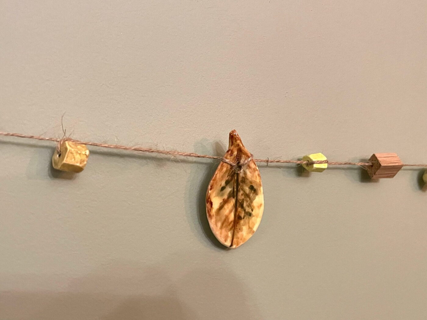 Ceramic Autumn Leaf Garland — Green, Yellow & Brown — in use