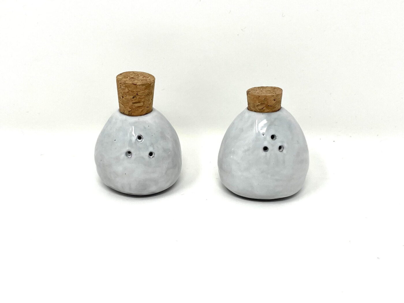 White & Grey Pinch-Pot Salt & Pepper Shakers — in use