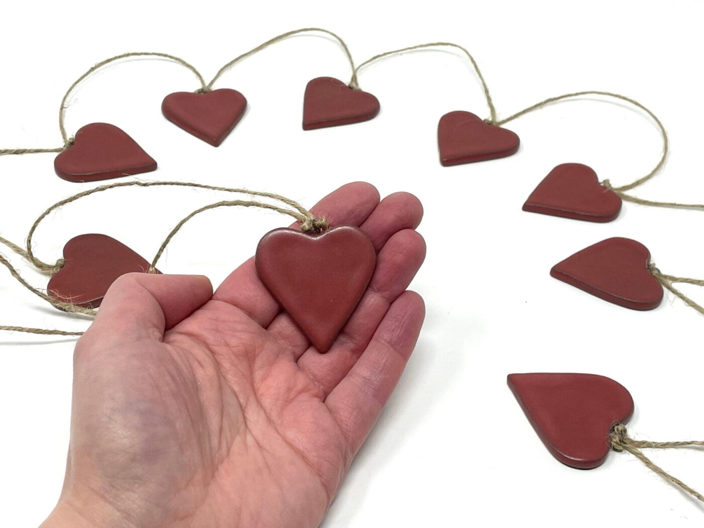 il_fullxfull.5791435997_kseb.jpg Satin Red Ceramic Heart Garland (9 Hearts)