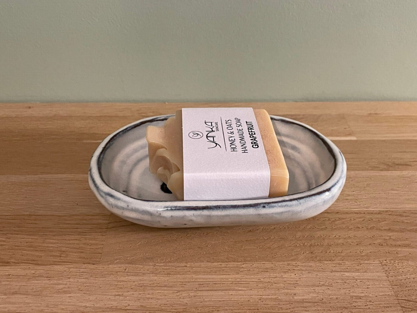 White Ceramic Soap Dish — Heart-Shaped Drainage Holes — back view