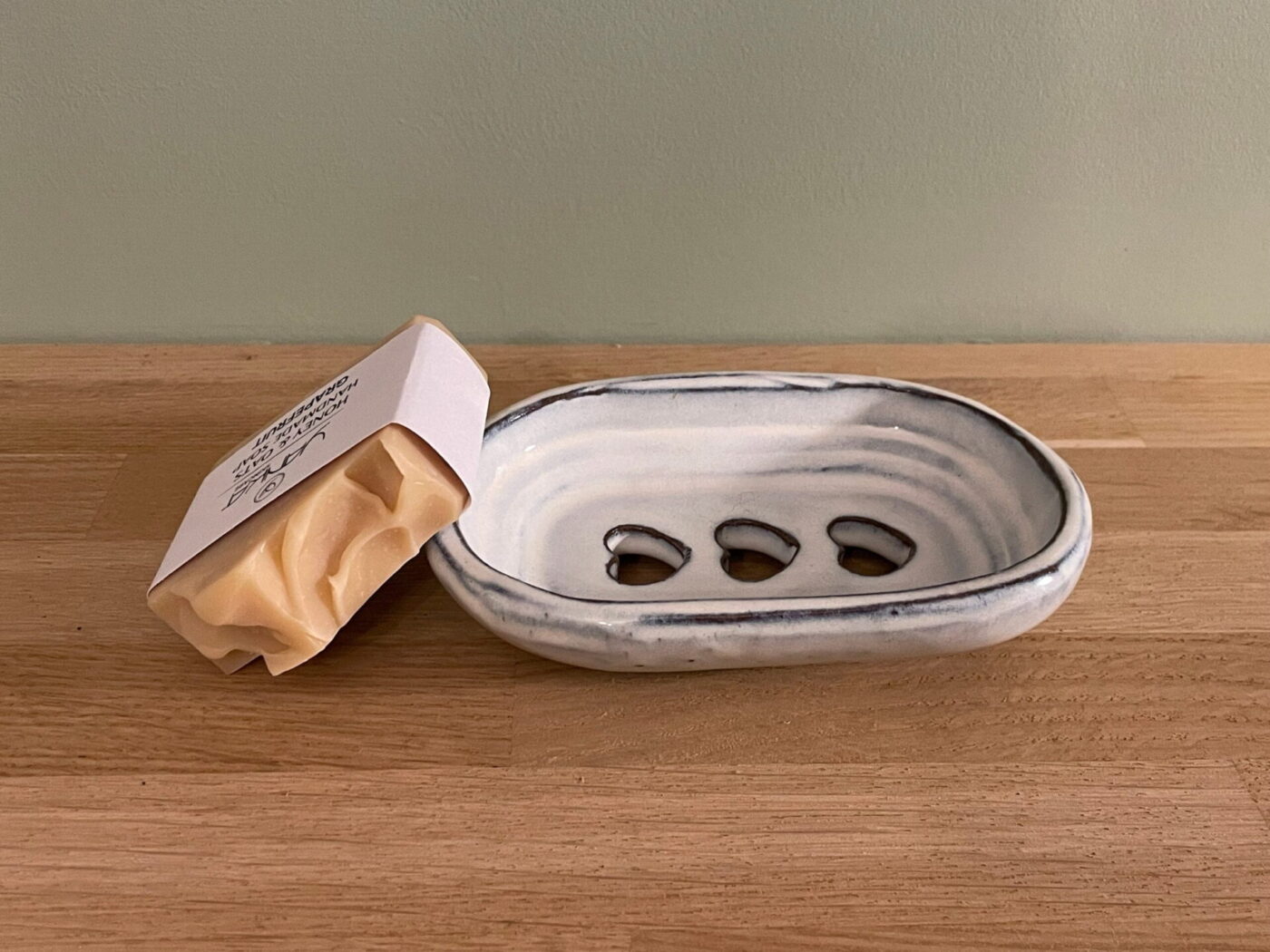 White Ceramic Soap Dish — Heart-Shaped Drainage Holes — detail view