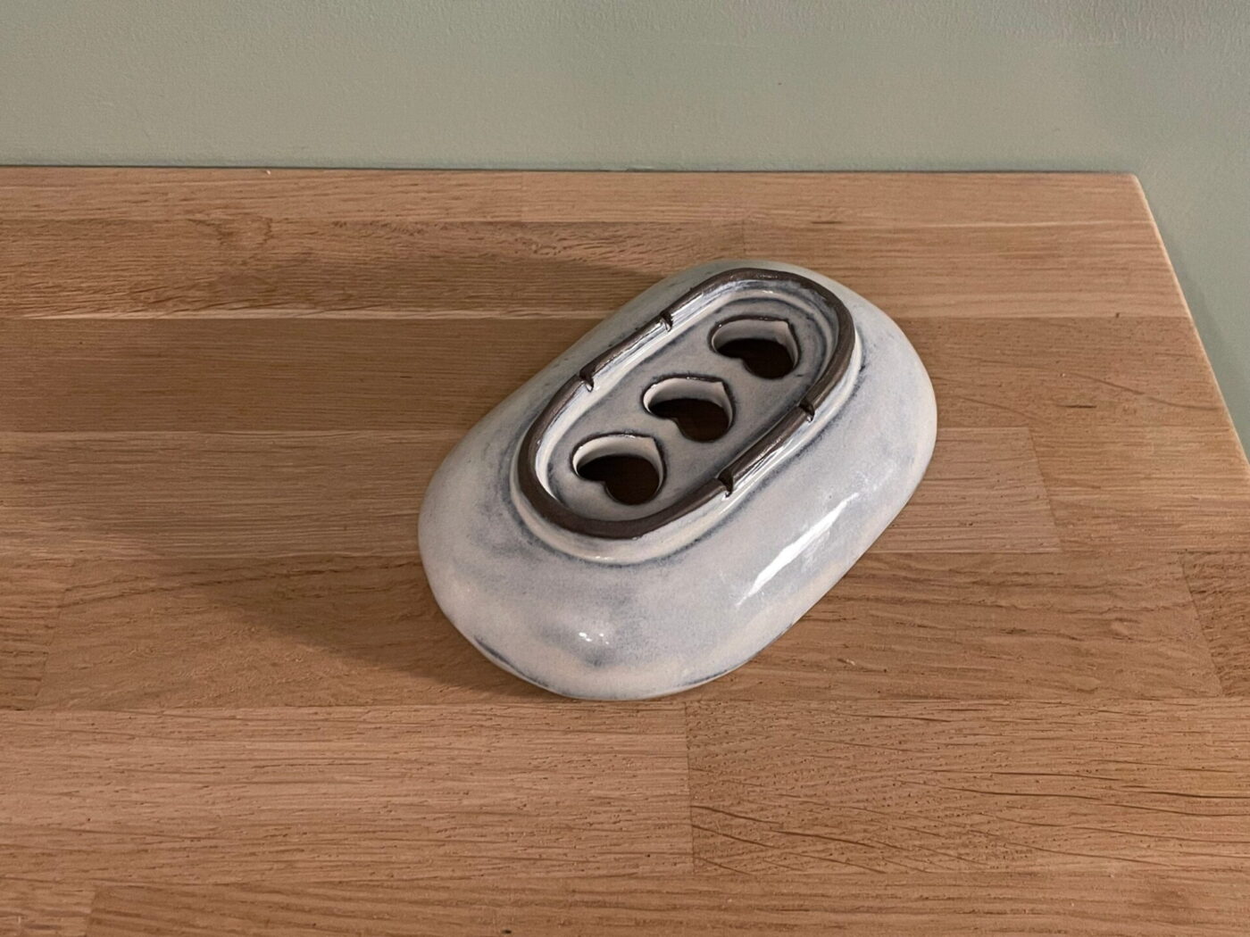 White Ceramic Soap Dish — Heart-Shaped Drainage Holes — close-up