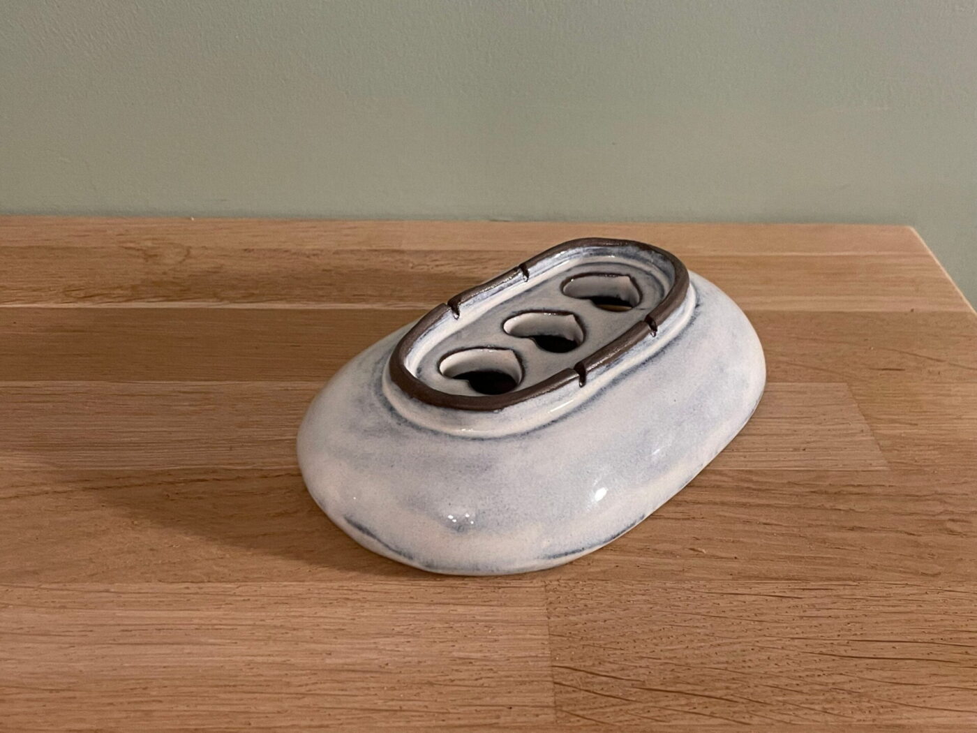 White Ceramic Soap Dish — Heart-Shaped Drainage Holes — close-up