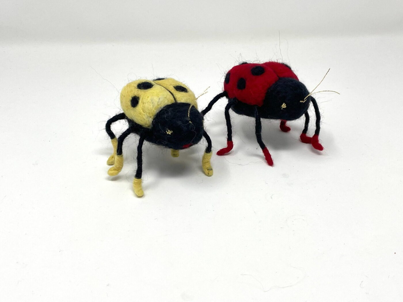 Wool Felted Ladybirds — Red & Yellow — scale view