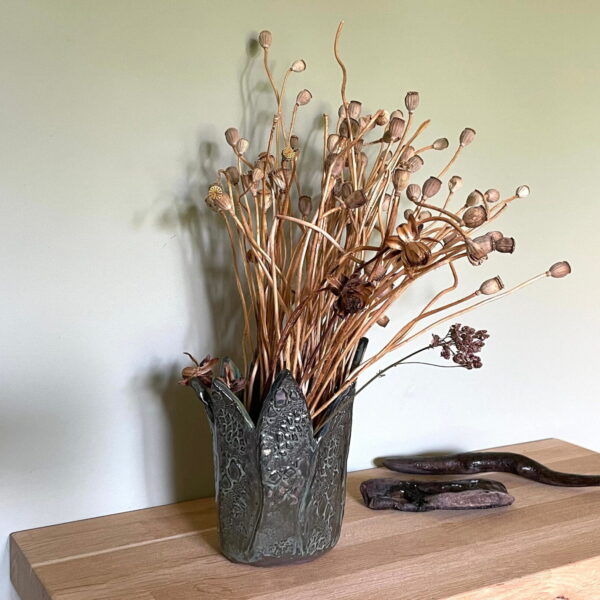 Dark Green hand built ceramic vase with textured leaf shaped walls