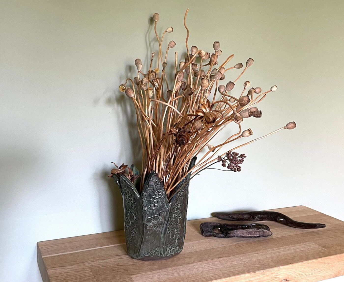 Dark Green Leaf-Textured Ceramic Vase — close-up