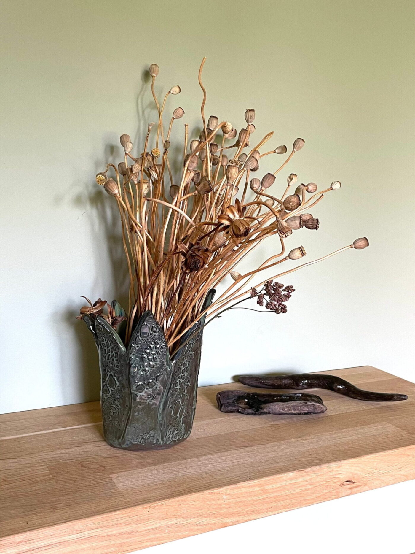 Dark Green Leaf-Textured Ceramic Vase — side view