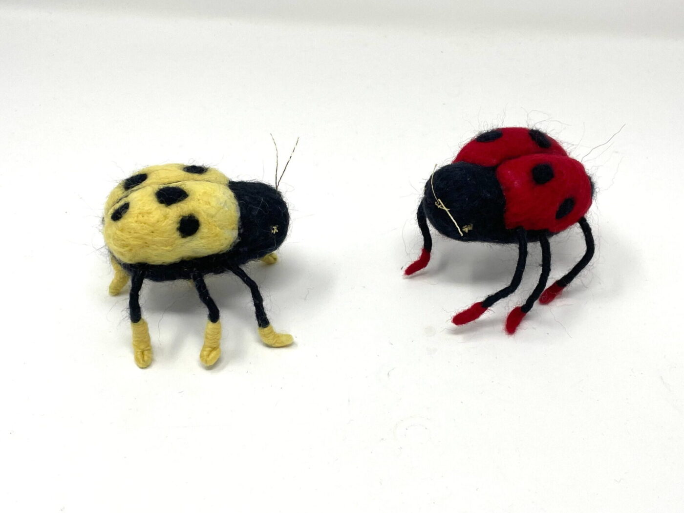Wool Felted Ladybirds — Red & Yellow — close-up