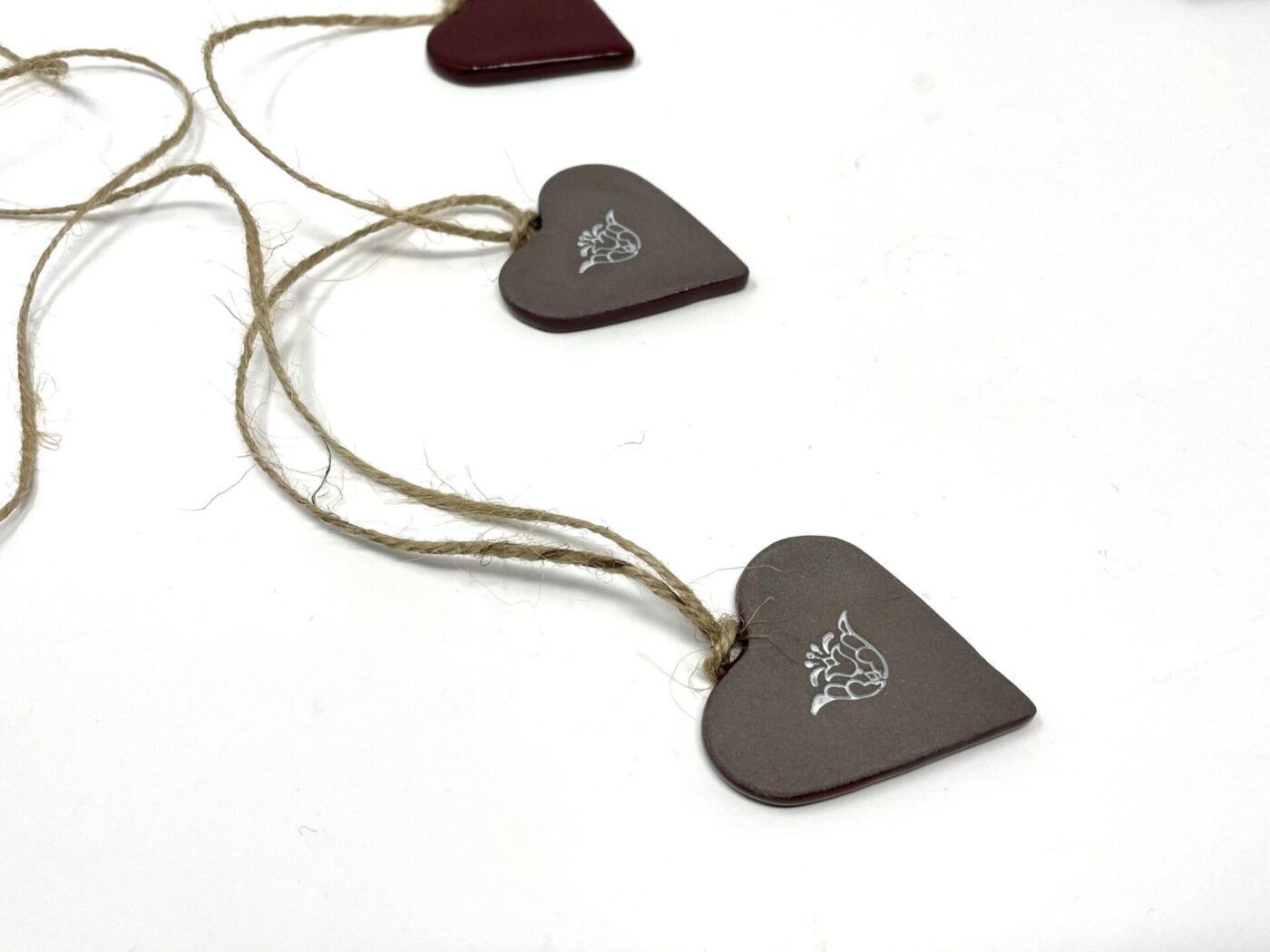 Deep Firebrick Red Ceramic Heart Garland (9 Hearts) — in use