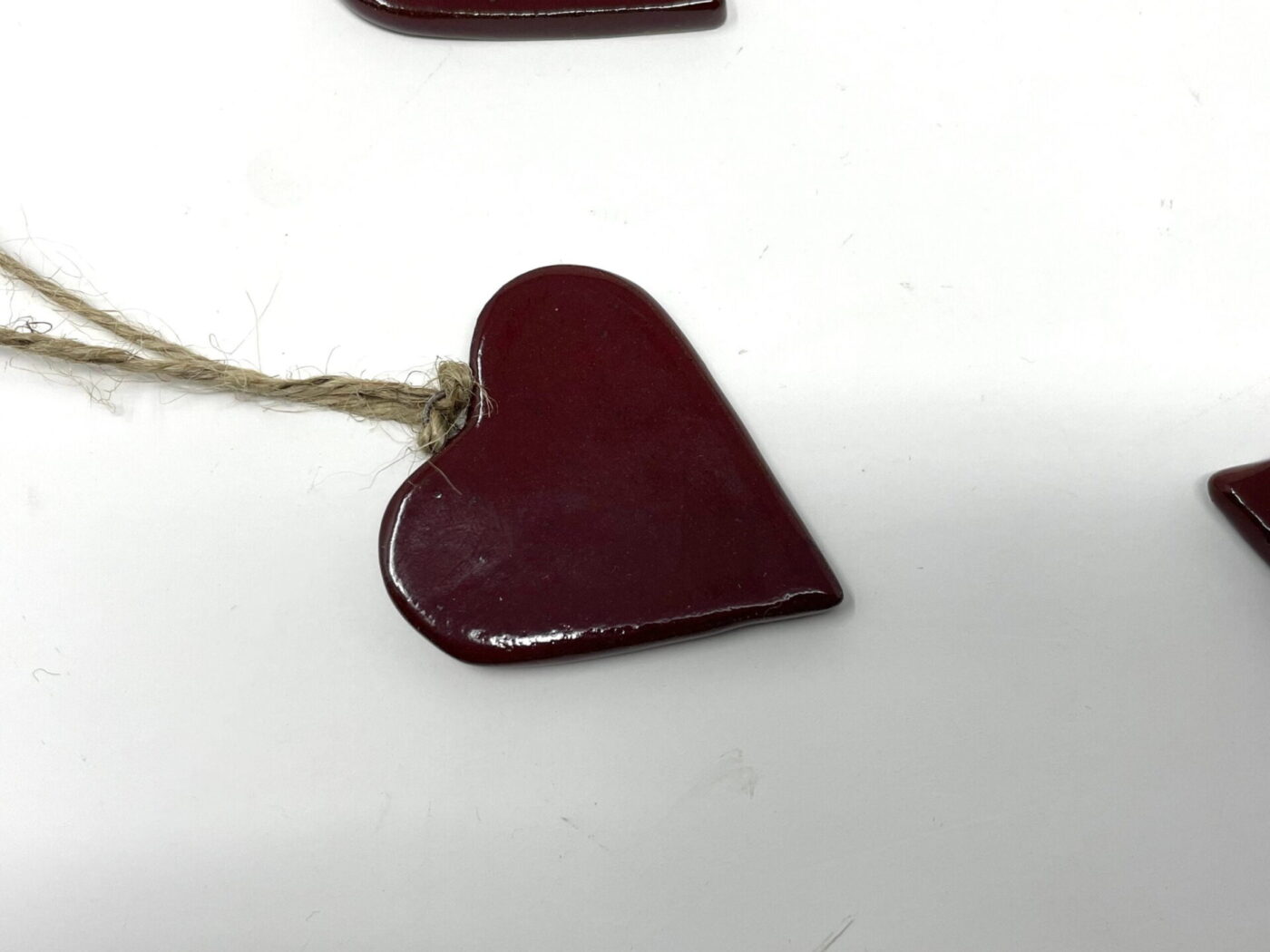 Deep Firebrick Red Ceramic Heart Garland (9 Hearts) — top view