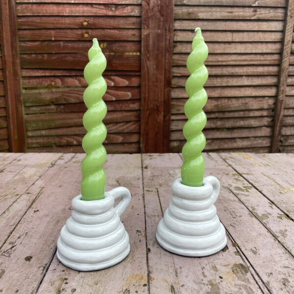 White ceramic candle stick holder with handle made from grey clay