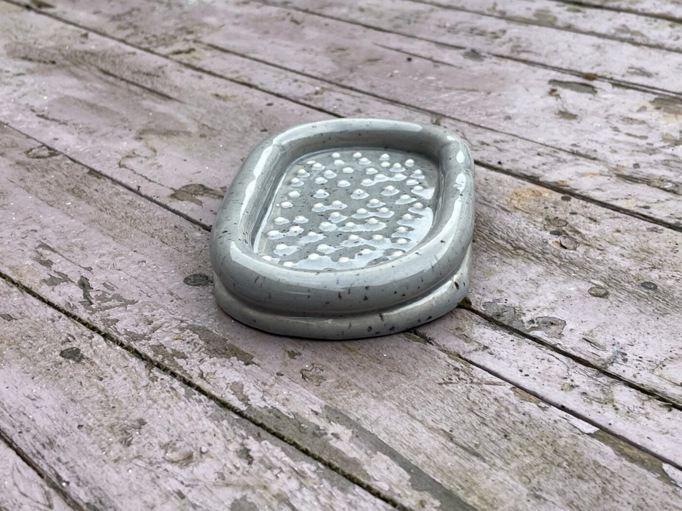 Grey Speckled Ceramic Soap Dish — in use