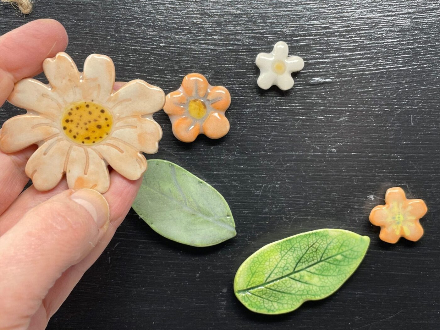 Orange Leaf & Flower Ceramic Magnet Set — close-up