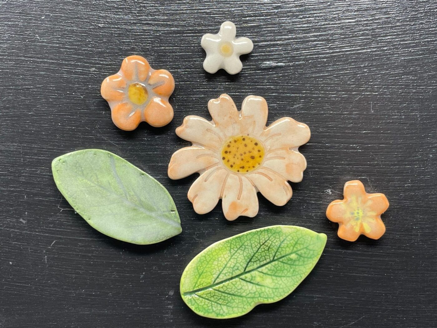Orange Leaf & Flower Ceramic Magnet Set — scale view