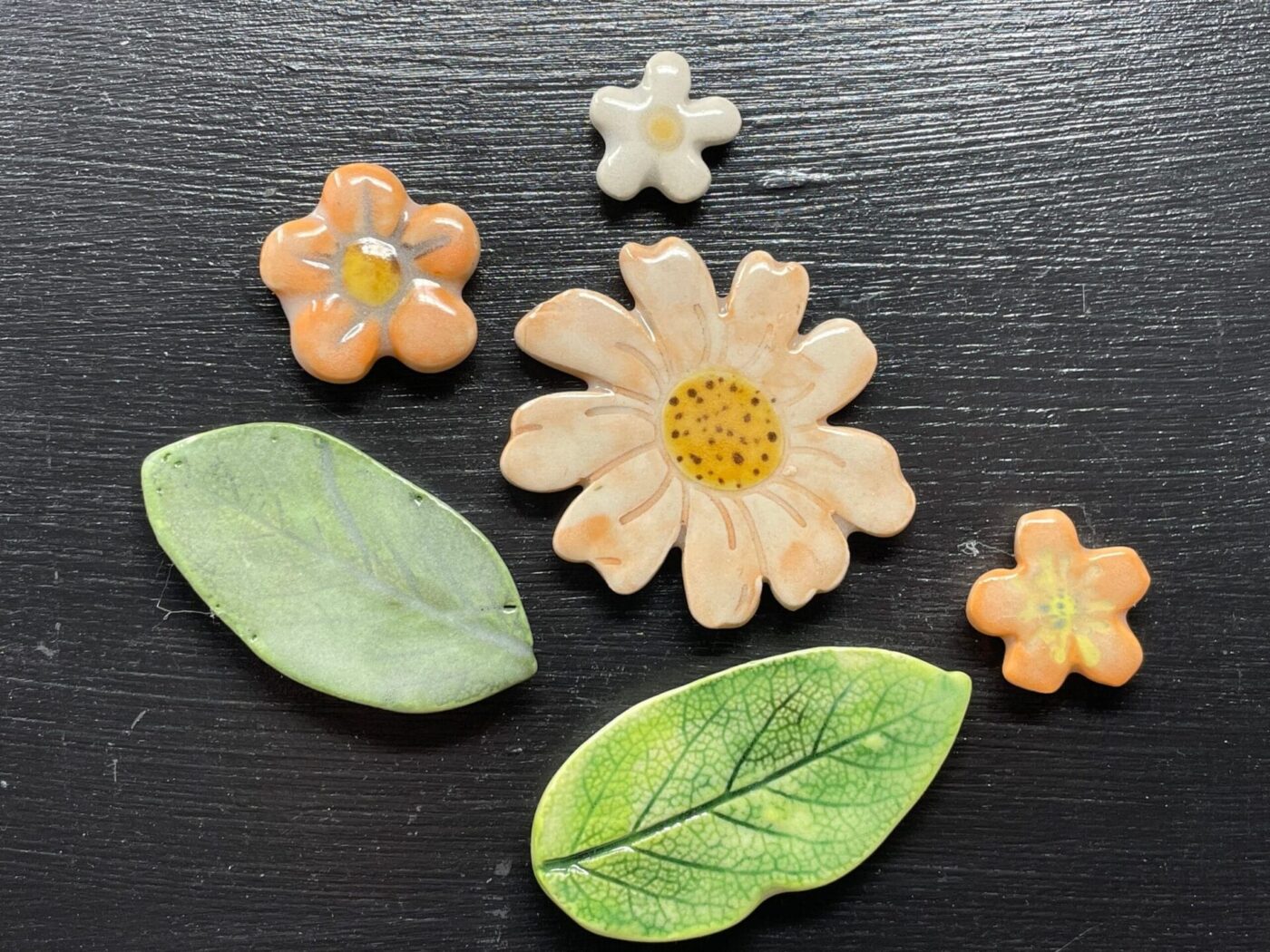 Orange Leaf & Flower Ceramic Magnet Set — top view