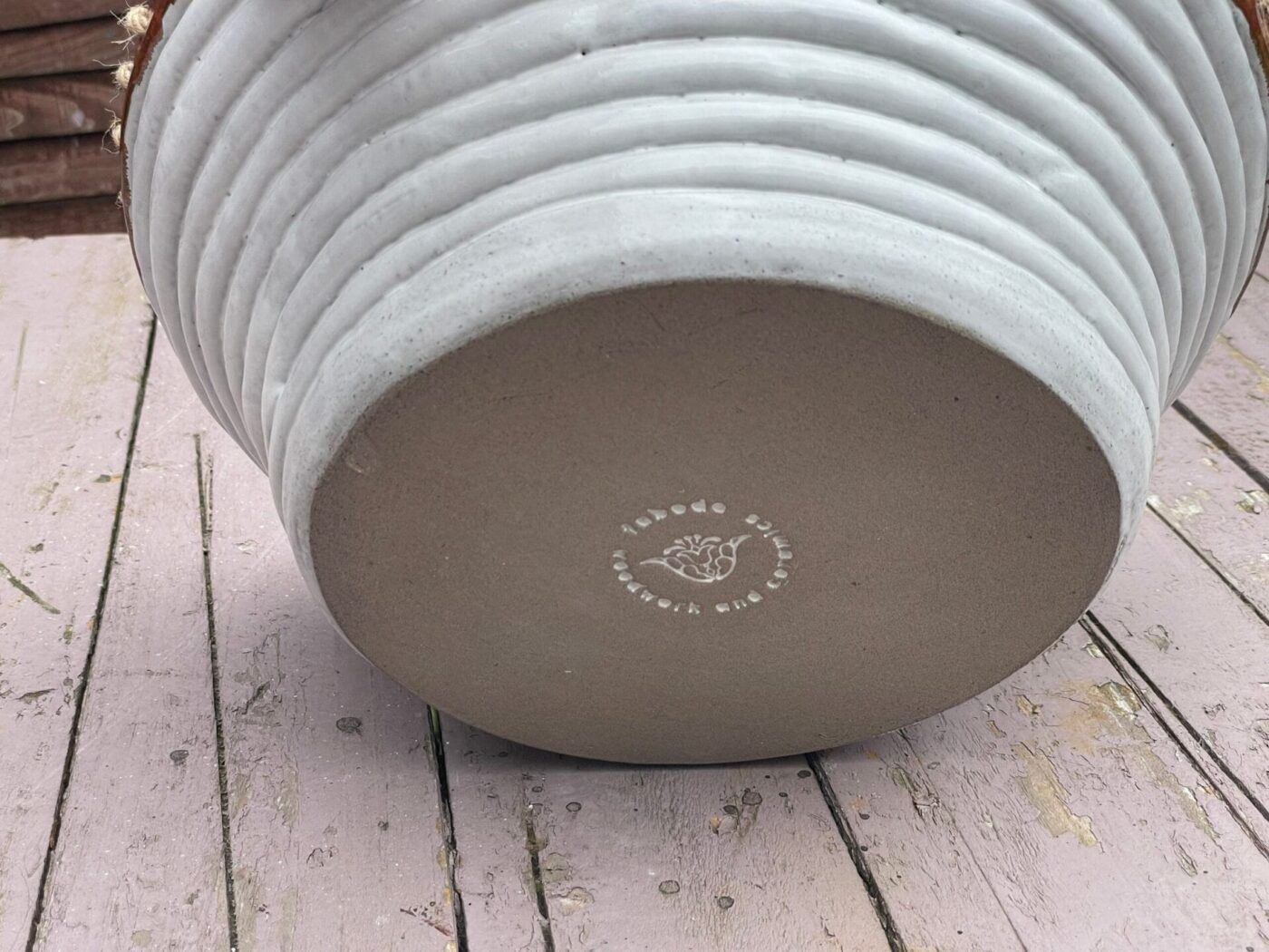 Large White & Copper Coiled Bowl with Hemp Rim — styling detail