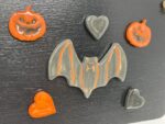 Set of 6 halloween ceramic magnets/ pumpkins, a bat and love hearts fridge magnets/ magnetic black board
