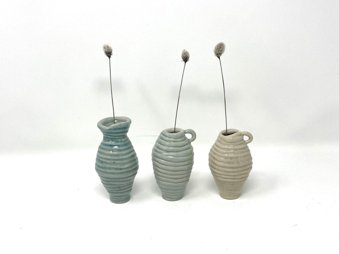 Coiled Mini Vase Trio (Bone, Blue, Teal) — top view