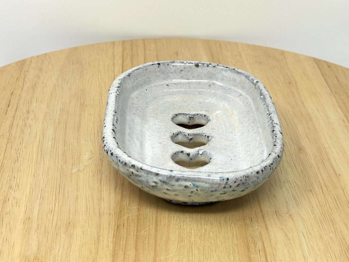 Off-White Heart Soap Dish, Grey Clay & Black Stone — scale view