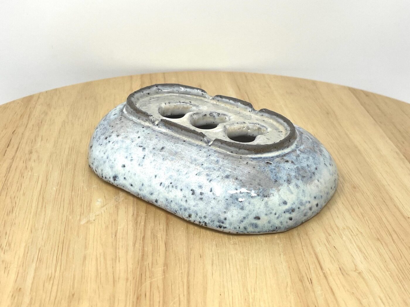 Off-White Heart Soap Dish, Grey Clay & Black Stone — close-up