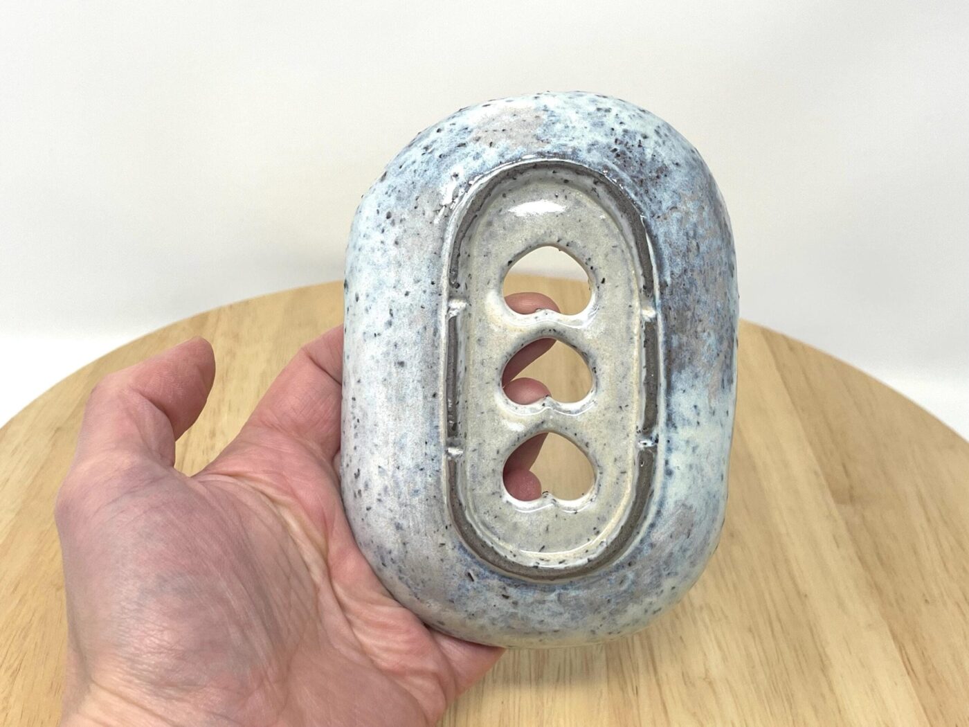 Off-White Heart Soap Dish, Grey Clay & Black Stone — side view