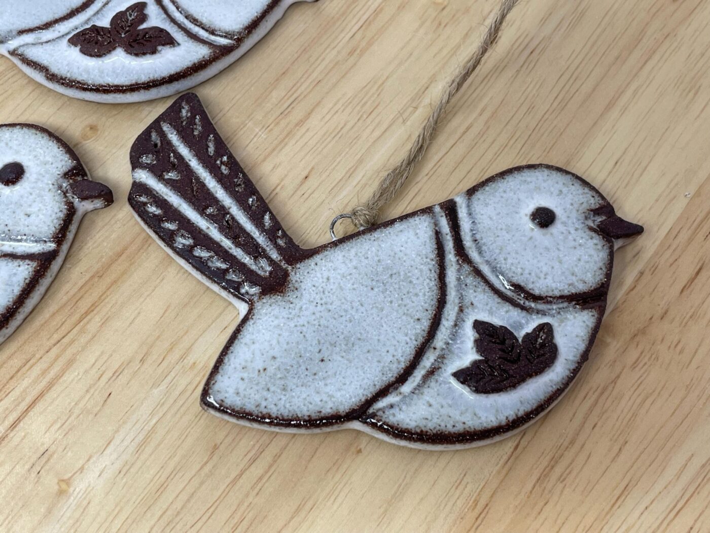 Hanging Ceramic Bird — Terracotta & White Glaze (Leaves) — top view