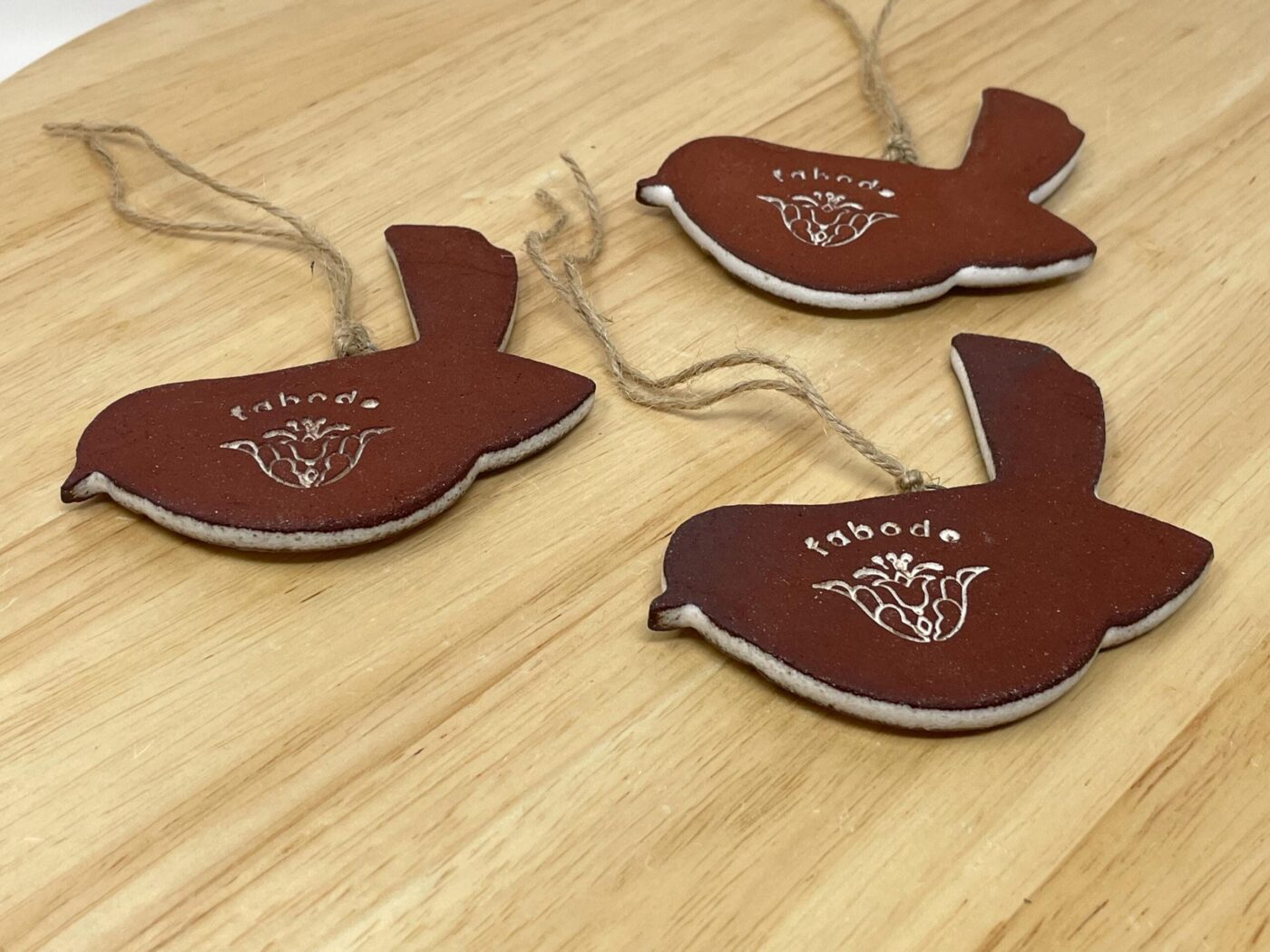 Hanging Ceramic Bird — Terracotta & White Glaze (Leaves) — side view