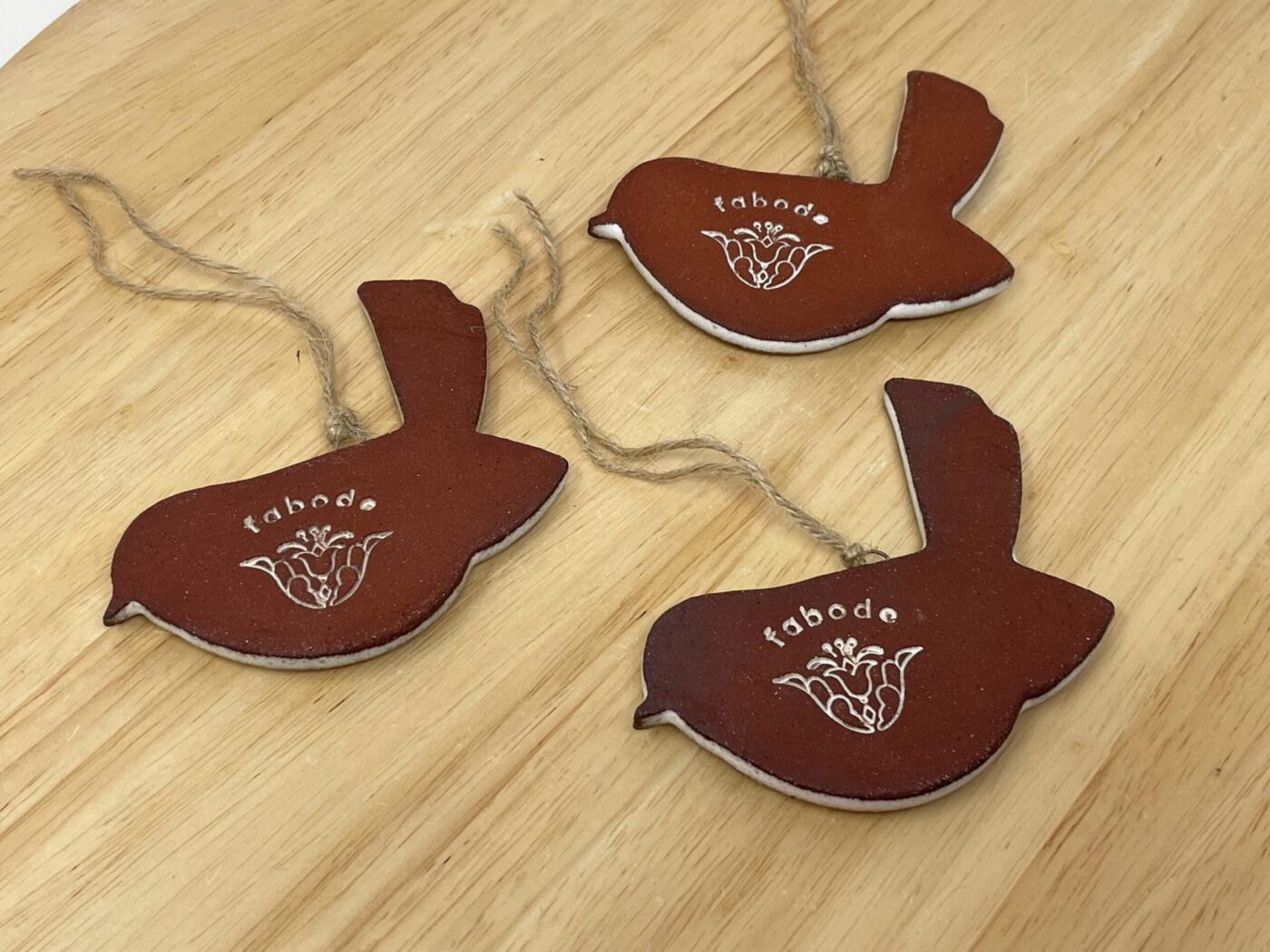 Hanging Ceramic Bird — Terracotta & White Glaze (Leaves) — close-up