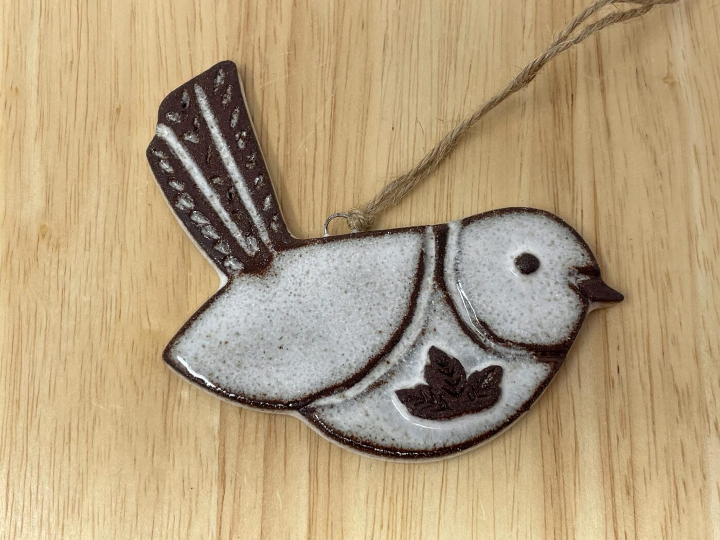Hanging Ceramic Bird — Terracotta & White Glaze (Leaves) — styling detail