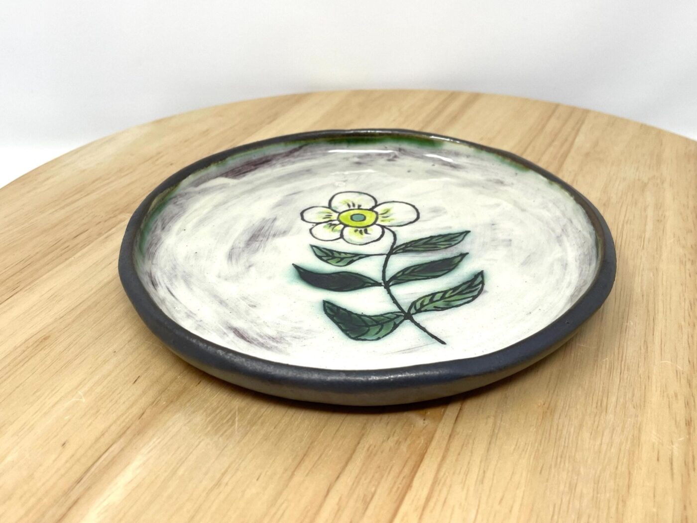 Sgraffito Flower Terracotta Plate — Green & Blue — side view