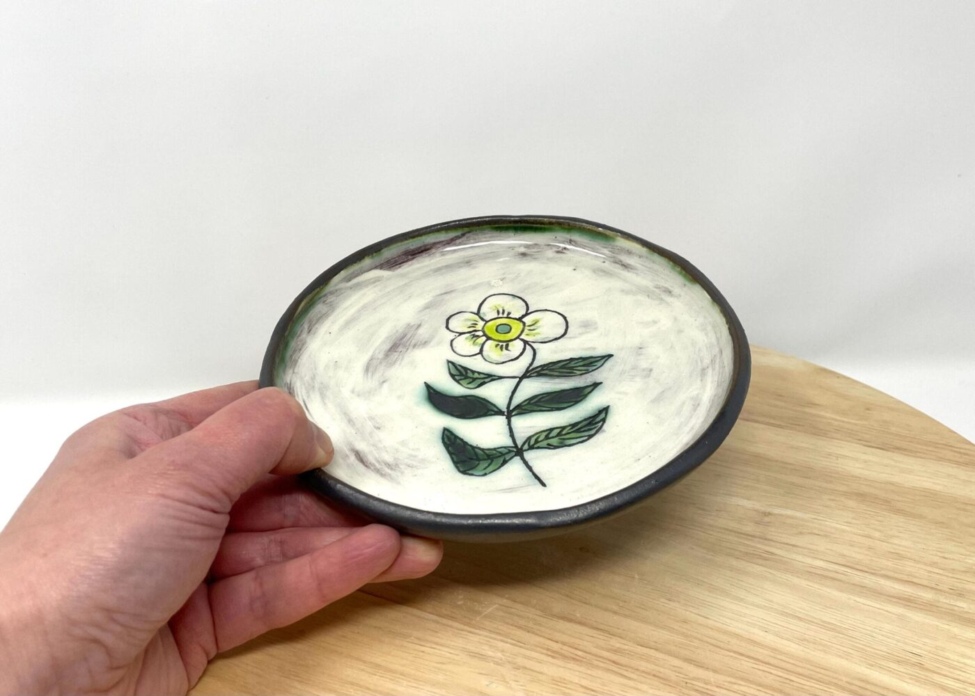 Sgraffito Flower Terracotta Plate — Green & Blue — close-up