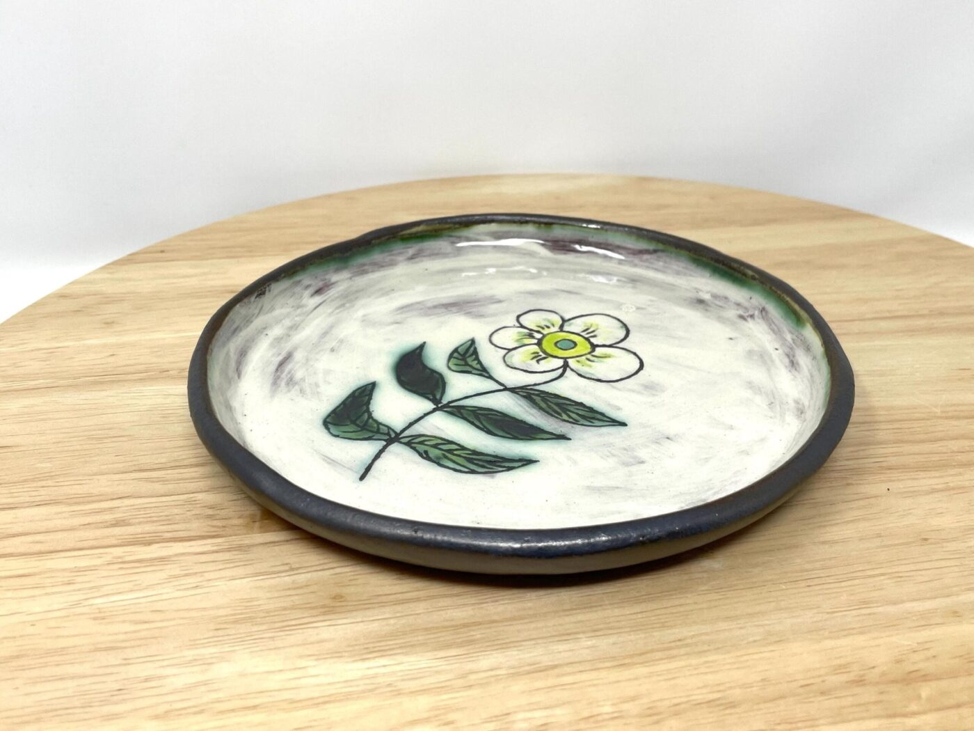 Sgraffito Flower Terracotta Plate — Green & Blue — back view