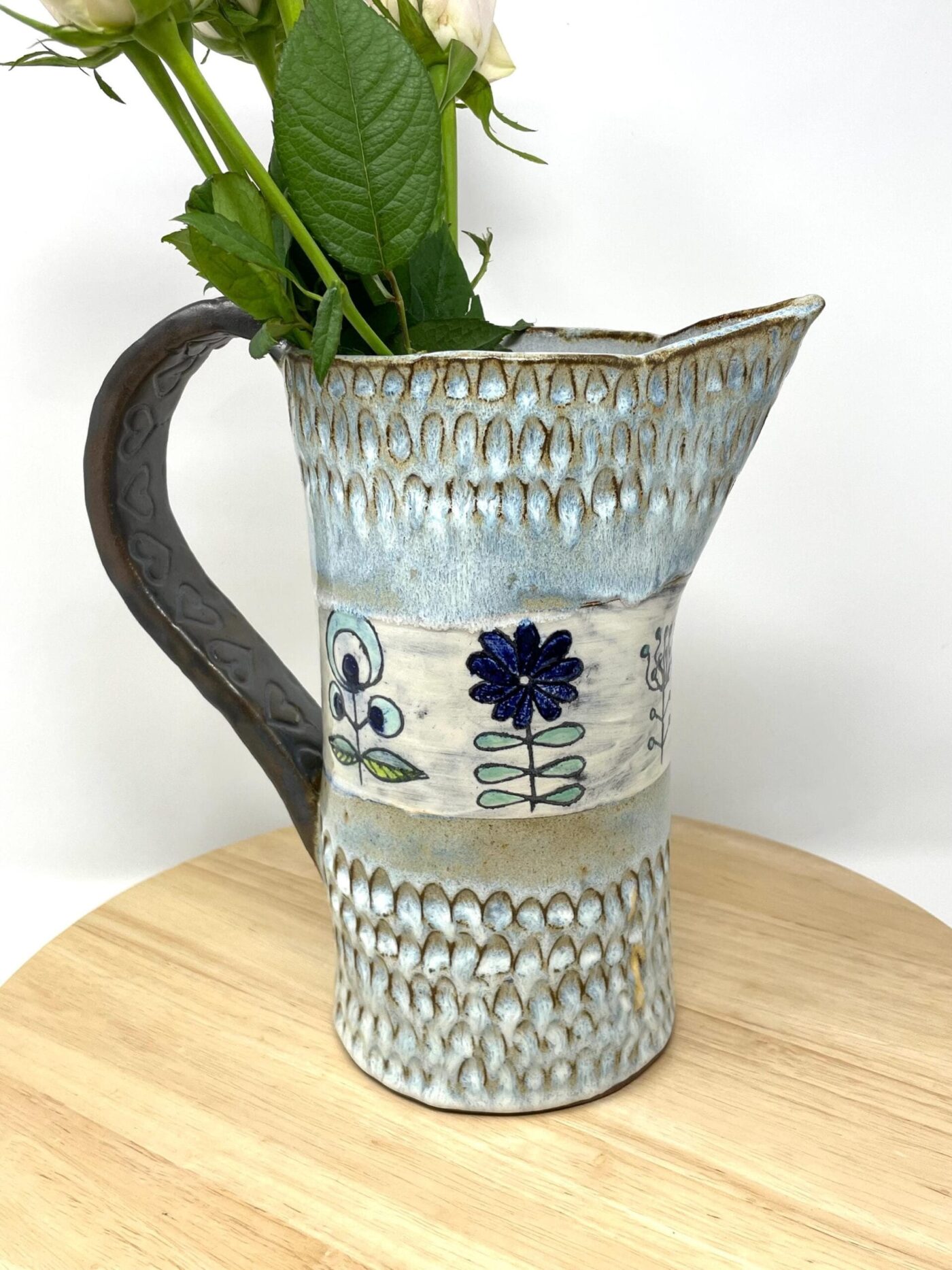 Terracotta Water Jug Vase, Blue Sgraffito Flowers — detail view