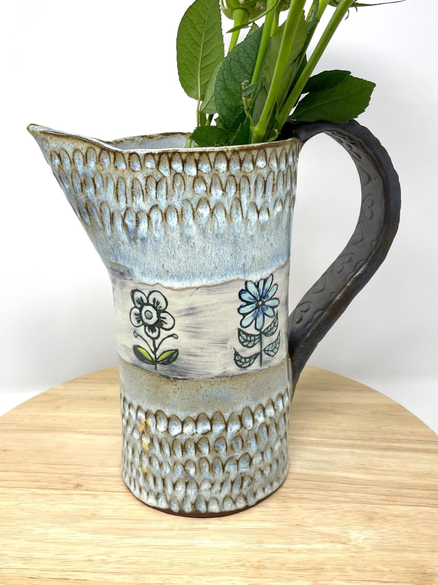 Terracotta Water Jug Vase, Blue Sgraffito Flowers — close-up