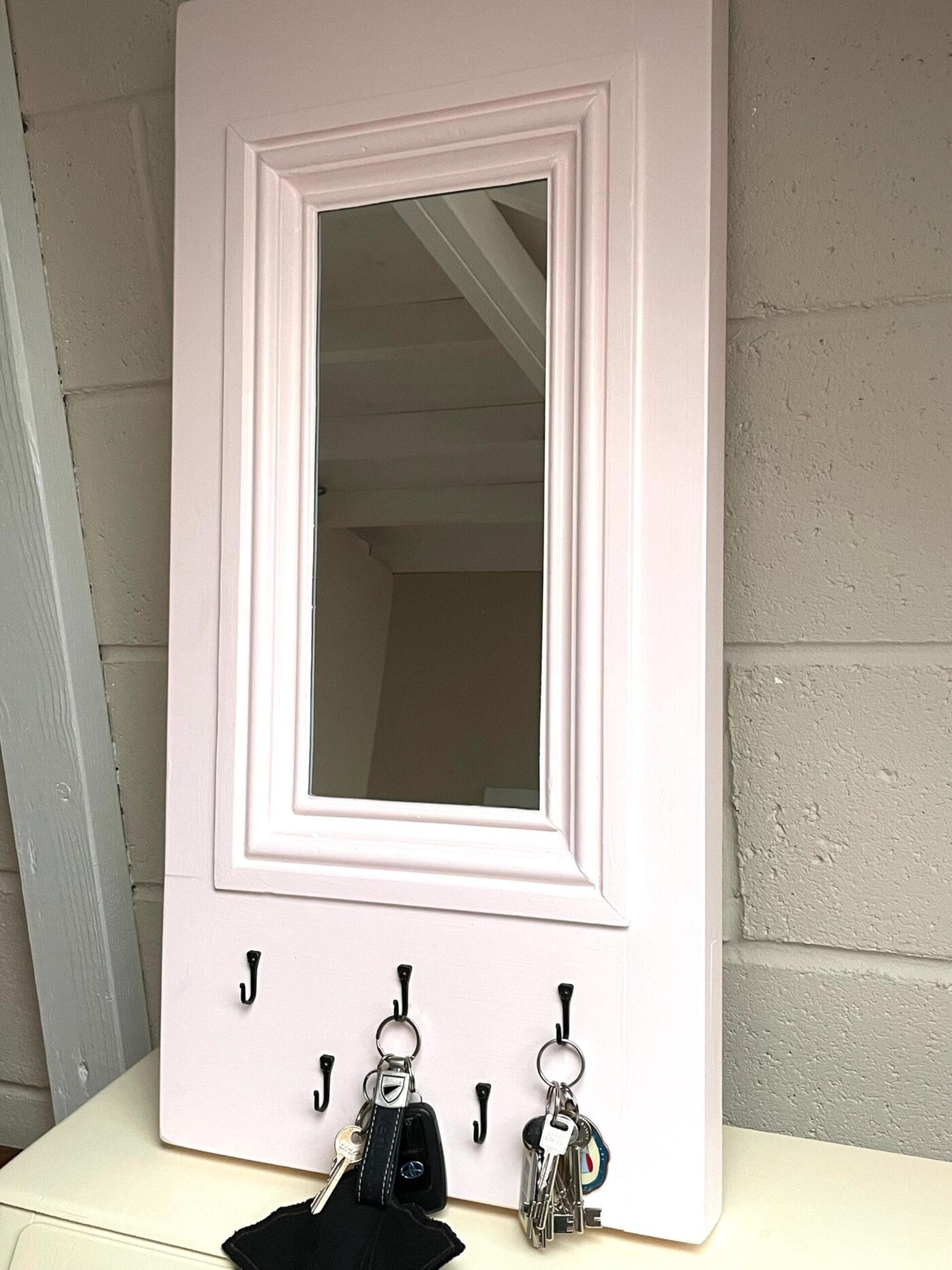 Vintage Door Panel Mirror with Key Hooks (Middleton Pink) — close-up