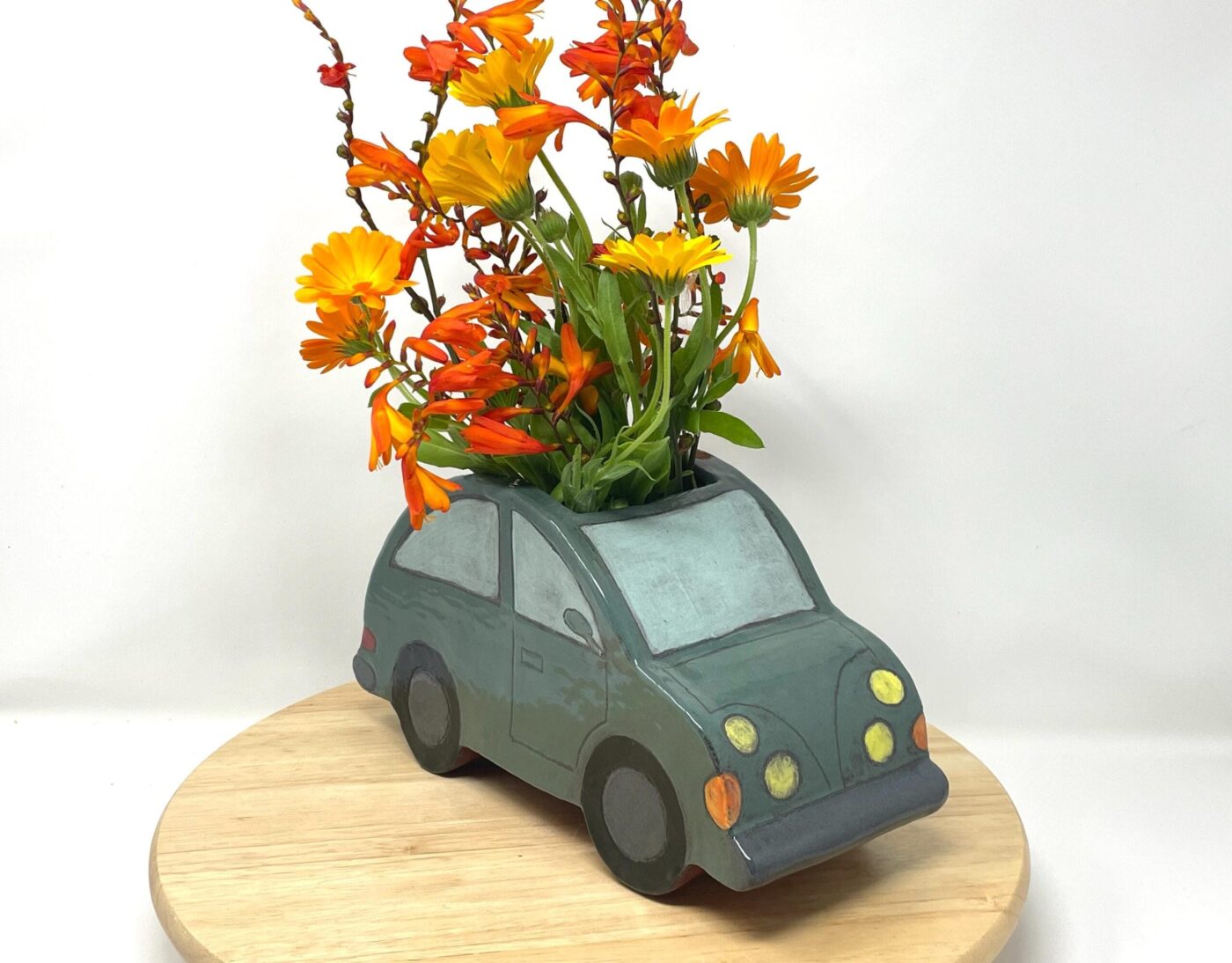 Dark Teal Ceramic Car Vase with Floral Roof — alternate angle