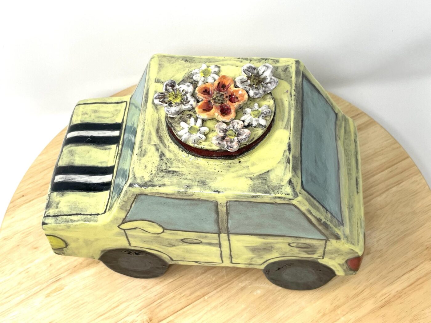 Pale Yellow Ceramic Car Vase with Floral Roof — scale view