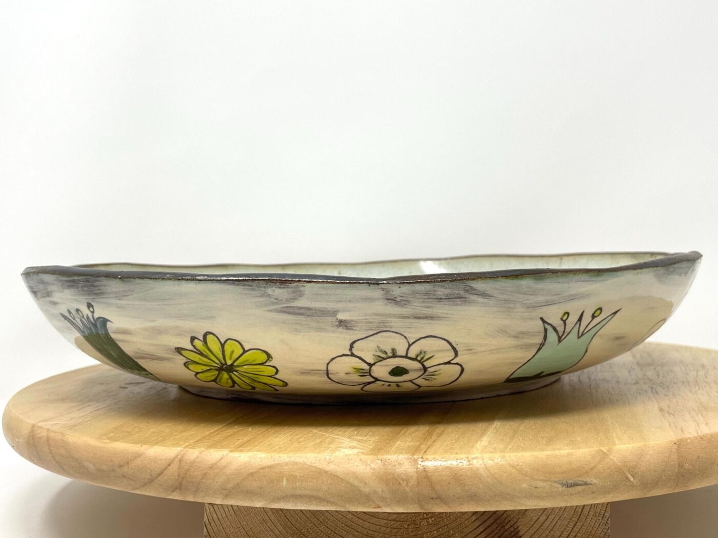 Sgraffito Floral Serving Bowl — detail view