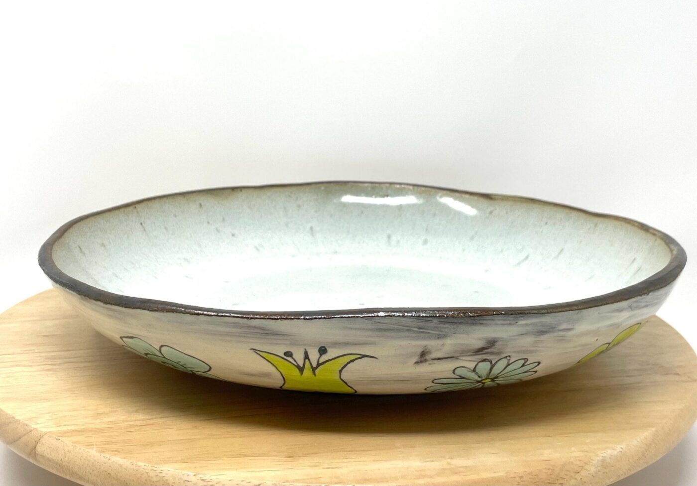Sgraffito Floral Serving Bowl — close-up