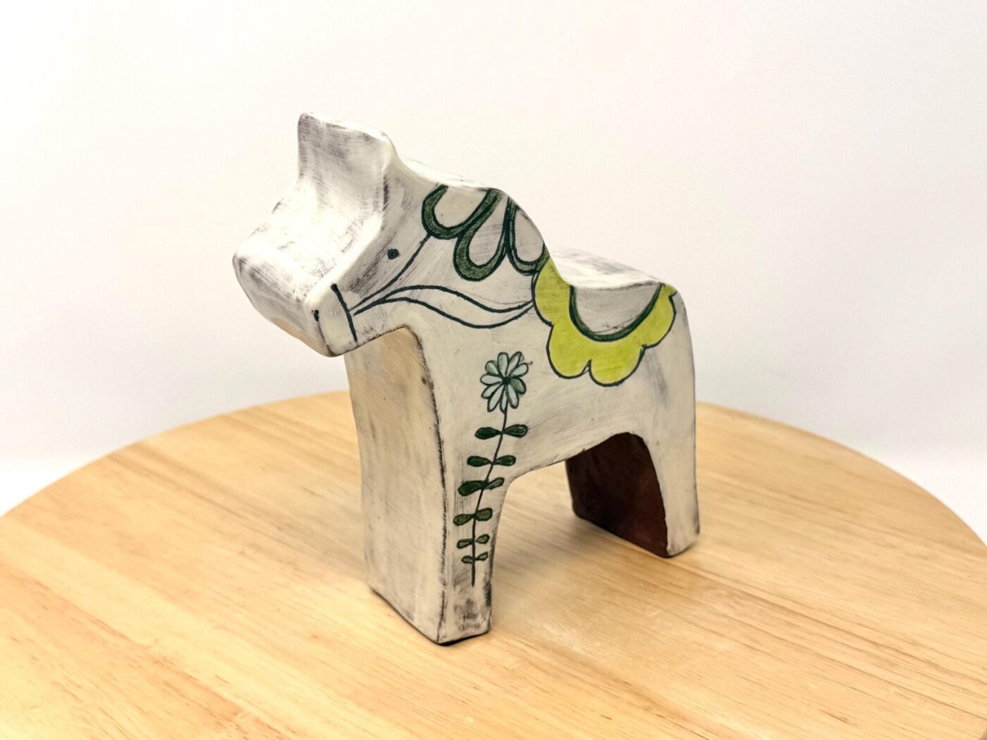 Sgraffito Miniature Dala Horse — side view