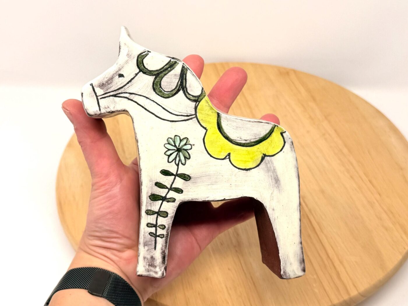 Sgraffito Miniature Dala Horse — in use